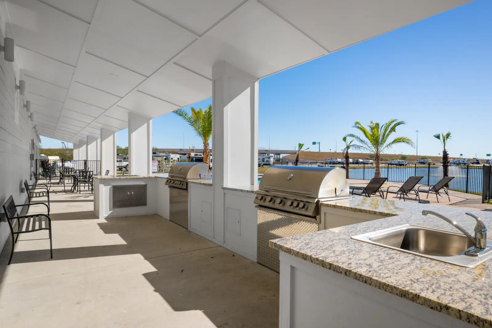 Covered outdoor kitchen and grills